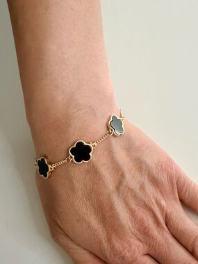 Gold Bracelet with Black Clover Links - Elegant Women's Jewelry
